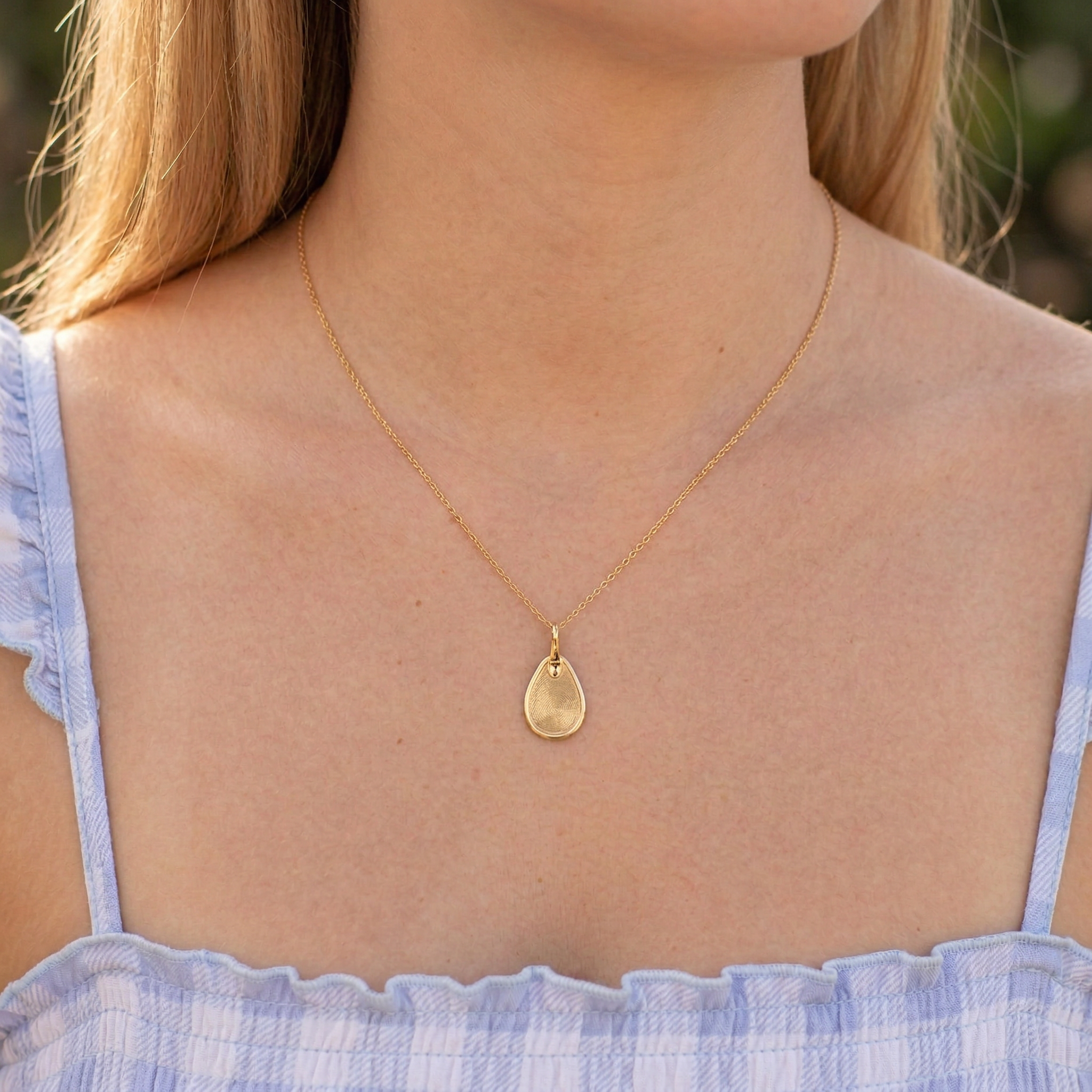 Gold Seal Tear Drop Pendant