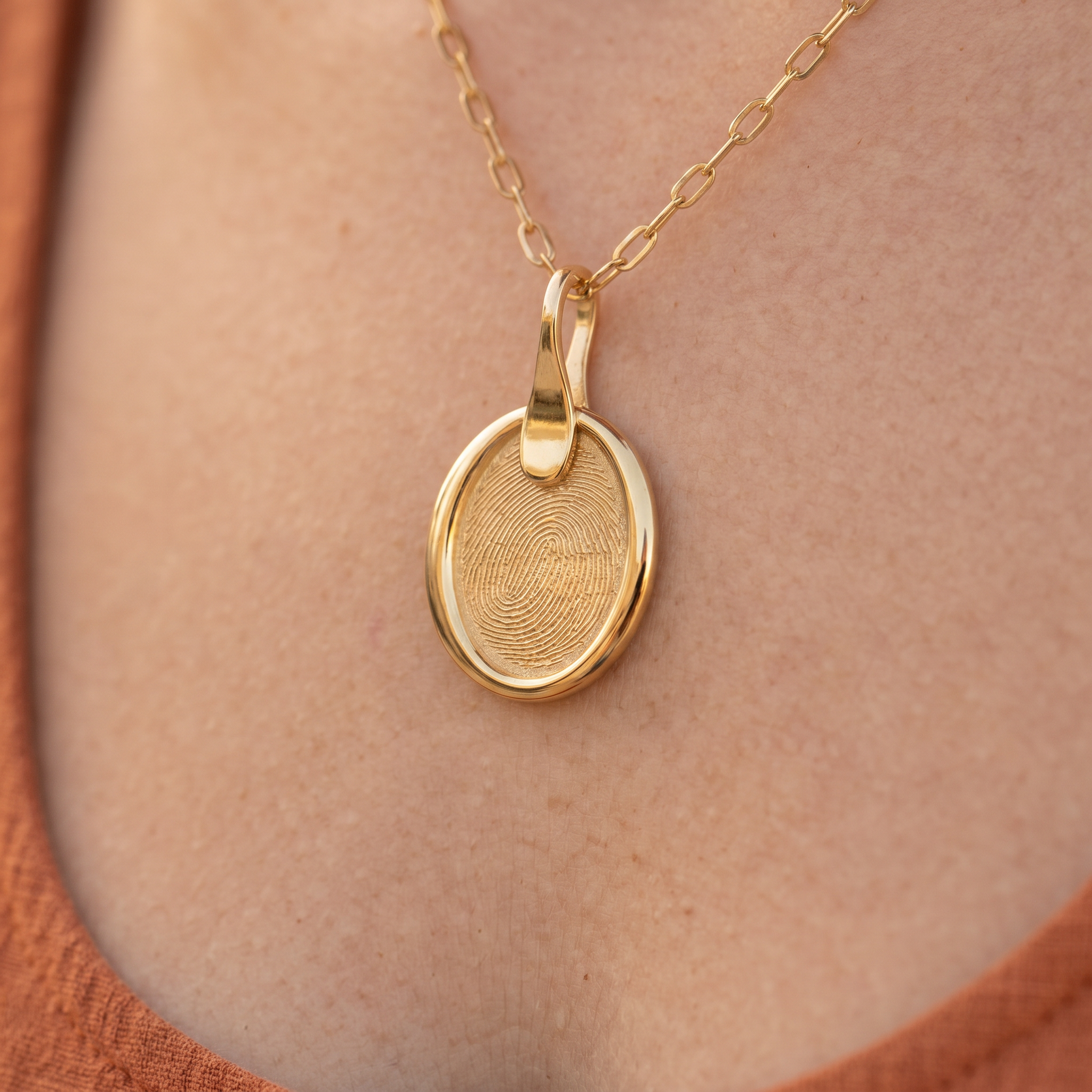 Gold Seal Oval Pendant