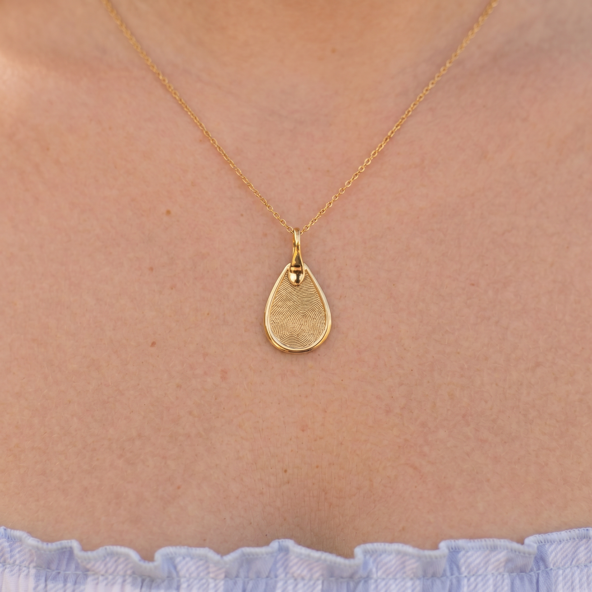 Gold Seal Tear Drop Pendant